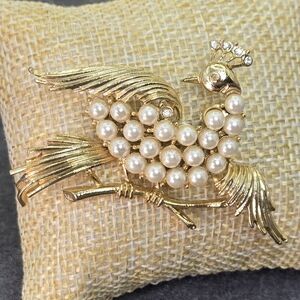Elegant Gold and Pearl Bird Brooch